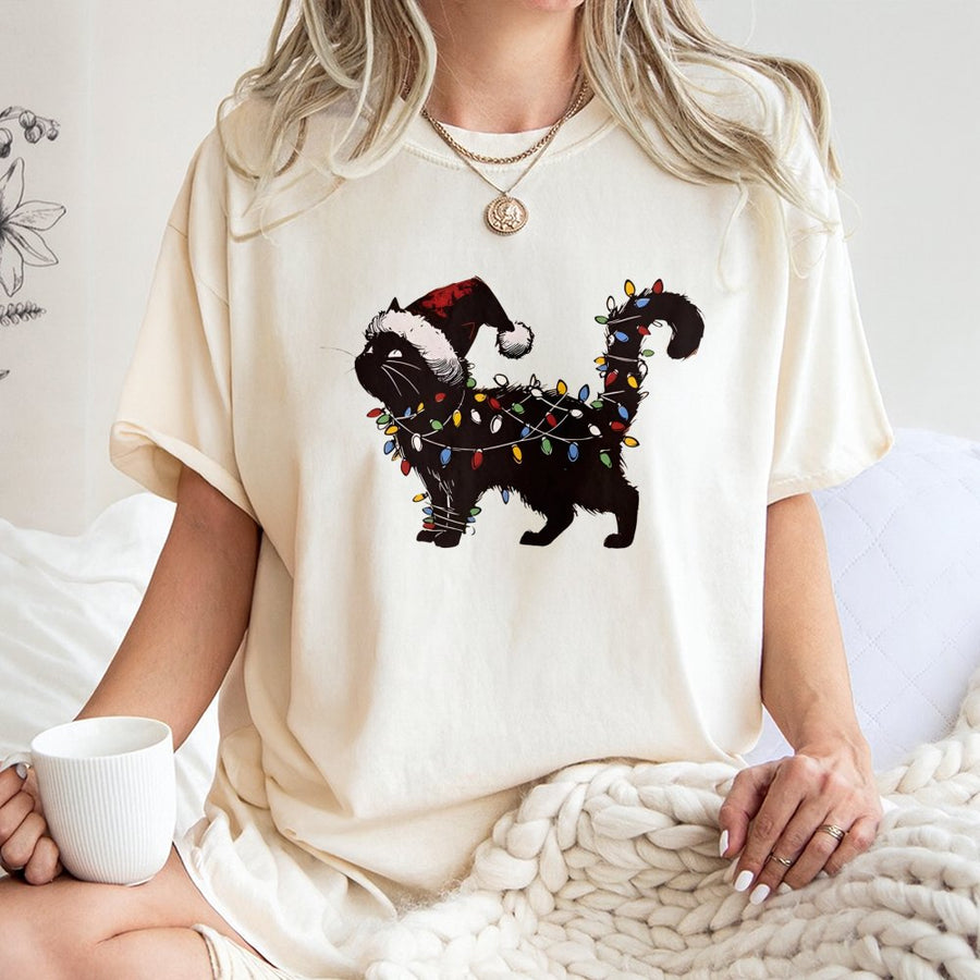 Christmas Cat T-Shirt | Black Kitten Wrapped In Holiday Lights Design | 100% Cotton Premium Tee | Funny Holiday Gift For Cat Lovers And Owners