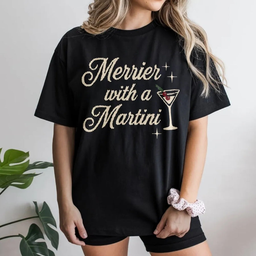 Merrier With A Martini T-Shirt | Retro Christmas Cocktail Graphic | Premium Soft Cotton Tee | Funny Holiday Drinking Gift For Women & Men
