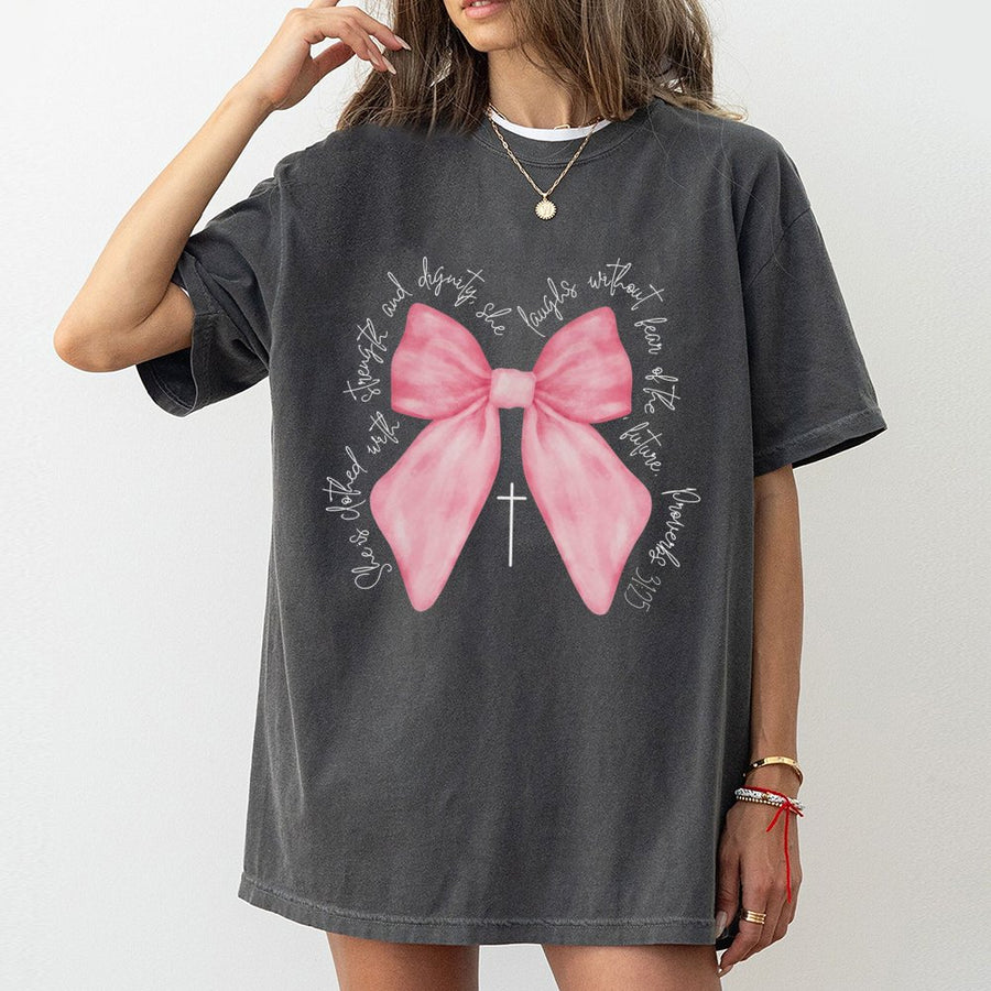 Proverbs 31:25 Bible Verse T-Shirt | Pink Bow Coquette Aesthetic Graphic | Premium 100% Cotton Tee | Christian Faith Gift for Women