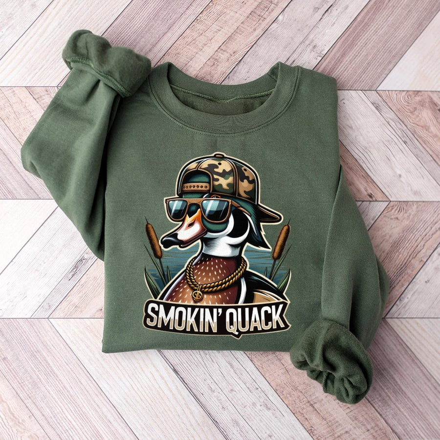 Smokin' Quack Duck Sweatshirt | Funny Hunting Graphic Crewneck | Premium Cotton-Blend Apparel | Gift for Duck Hunter or Waterfowl Lover