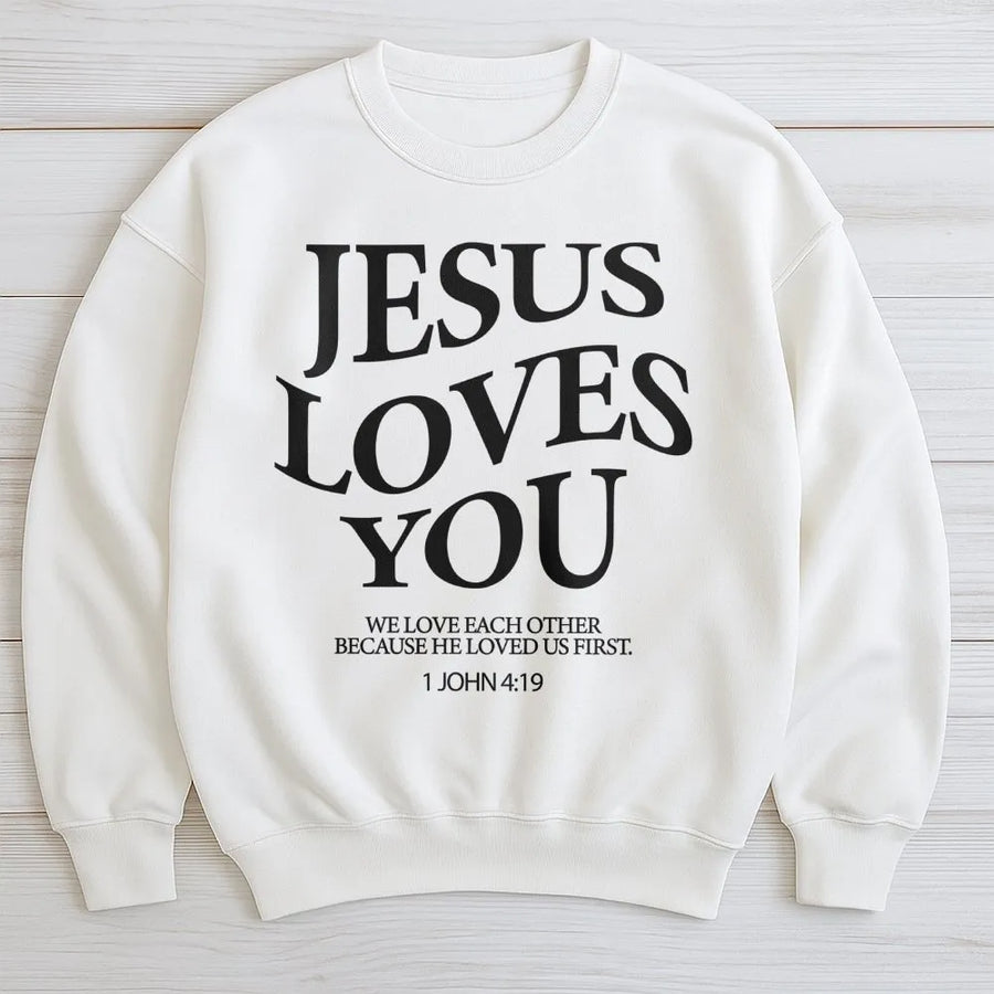 Jesus Loves You Sweatshirt | 1 John 4:19 Bible Verse Graphic | Premium Cotton Blend Crewneck | Christian Faith Gift for Women & Men
