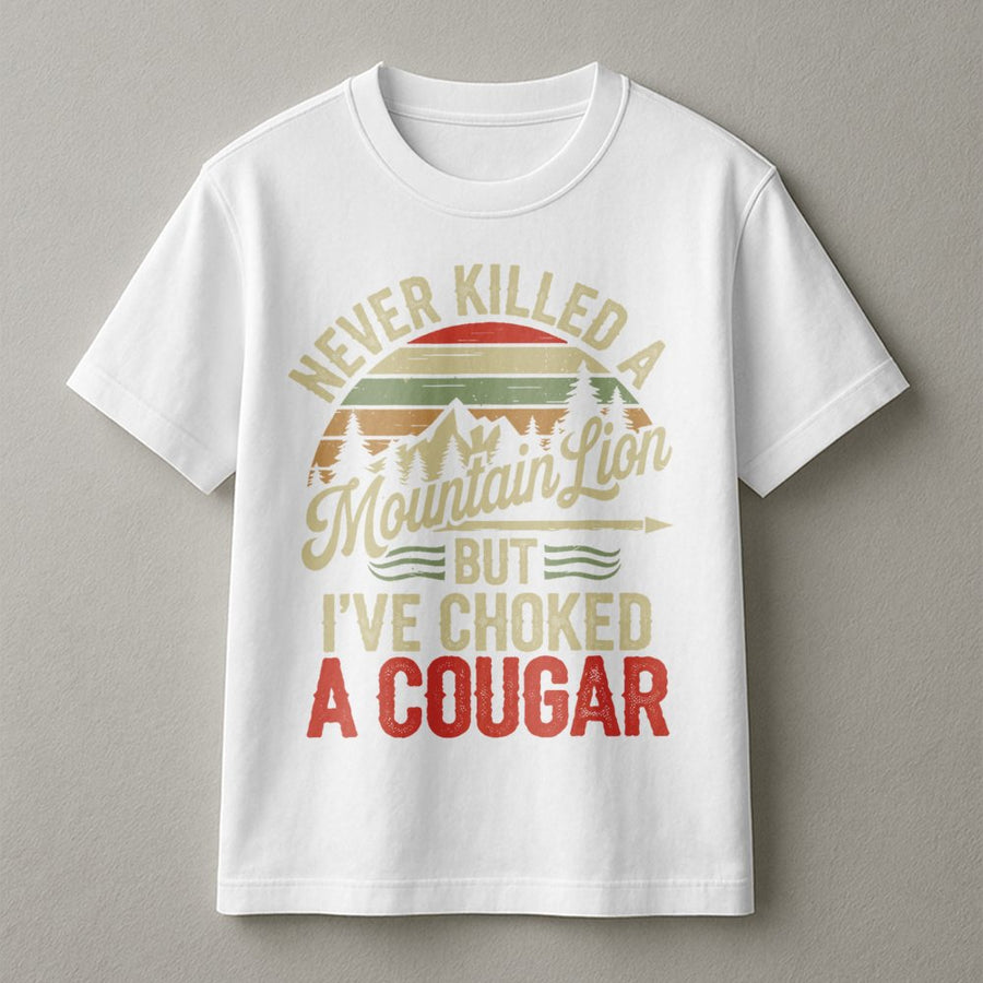 Never Killed A Mountain Lion But I've Choked A Cougar T-Shirt | Retro Outdoors Humor Graphic | Premium Cotton Unisex Tee | Funny Gag Gift For Him