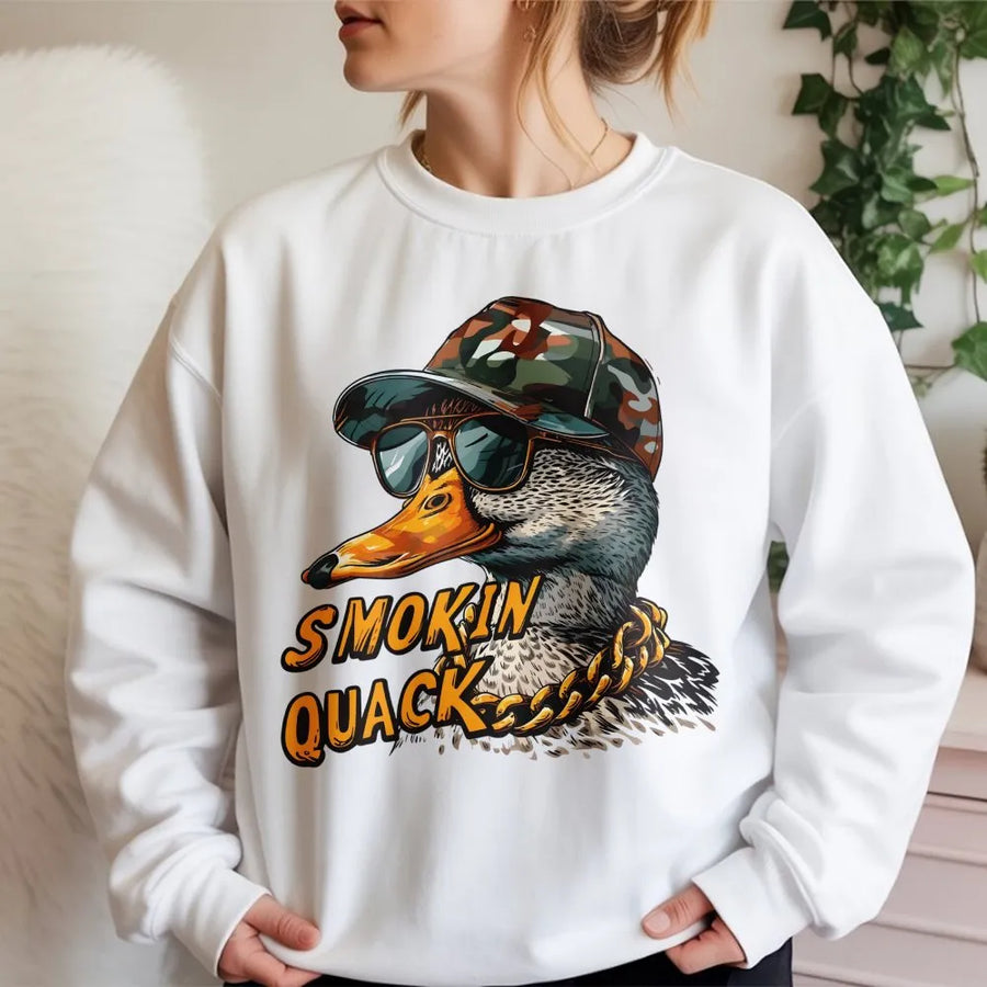 Smokin Quack Sweatshirt | Funny Duck with Camo Hat Design | Premium Cotton-Poly Blend | Humorous Graphic Gift for Duck Hunters and Bird Lovers