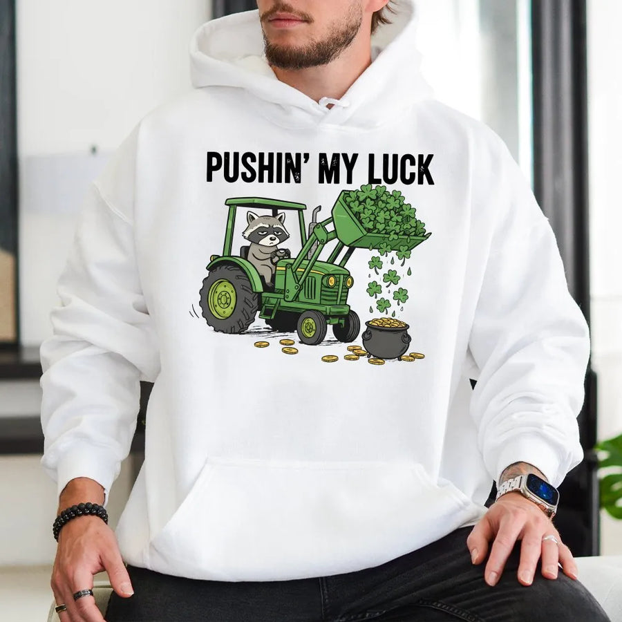 St Patrick’s Day Raccoon Hoodie | Funny Tractor Shamrock Design | Premium Unisex Pullover | Lucky Farm Humor Gift for Him Her