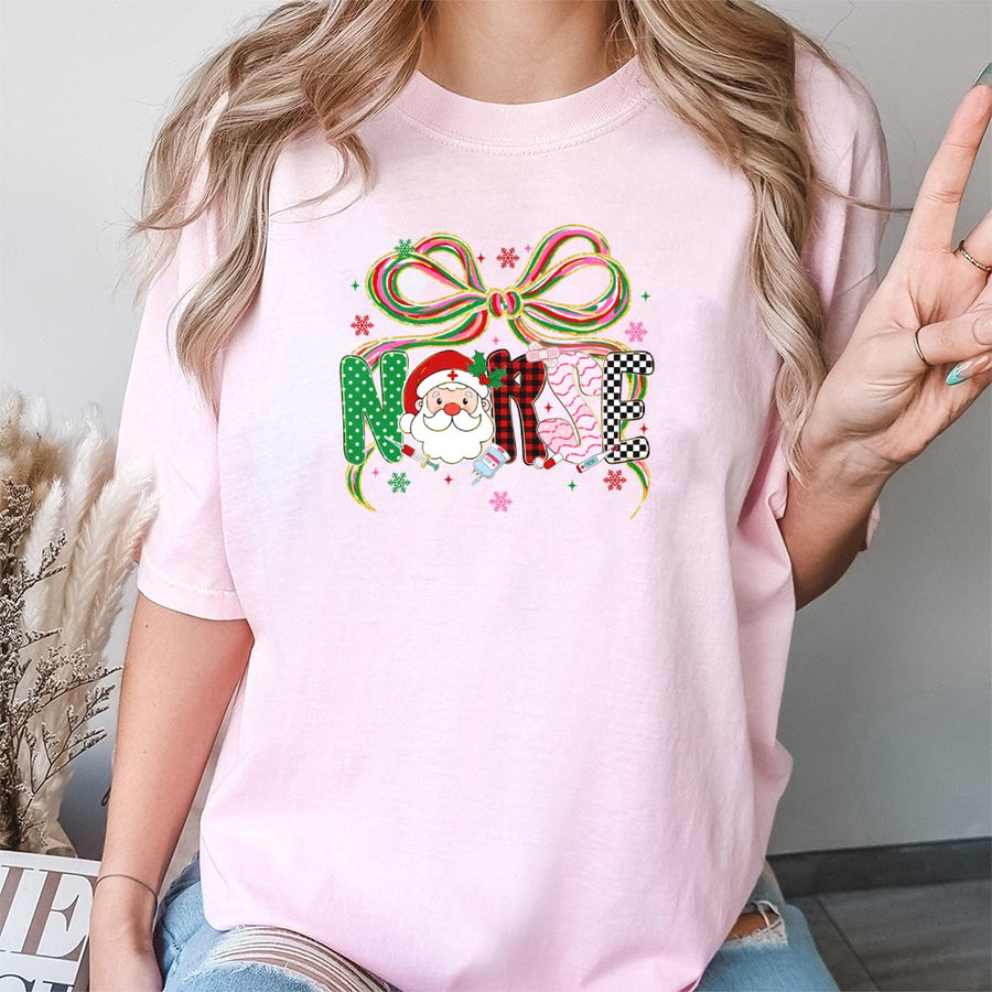 Christmas Nurse T-Shirt | Santa Coquette Bow Graphic Design | 100% Cotton Premium Tee | Holiday Gift for Nurses & Medical Professionals