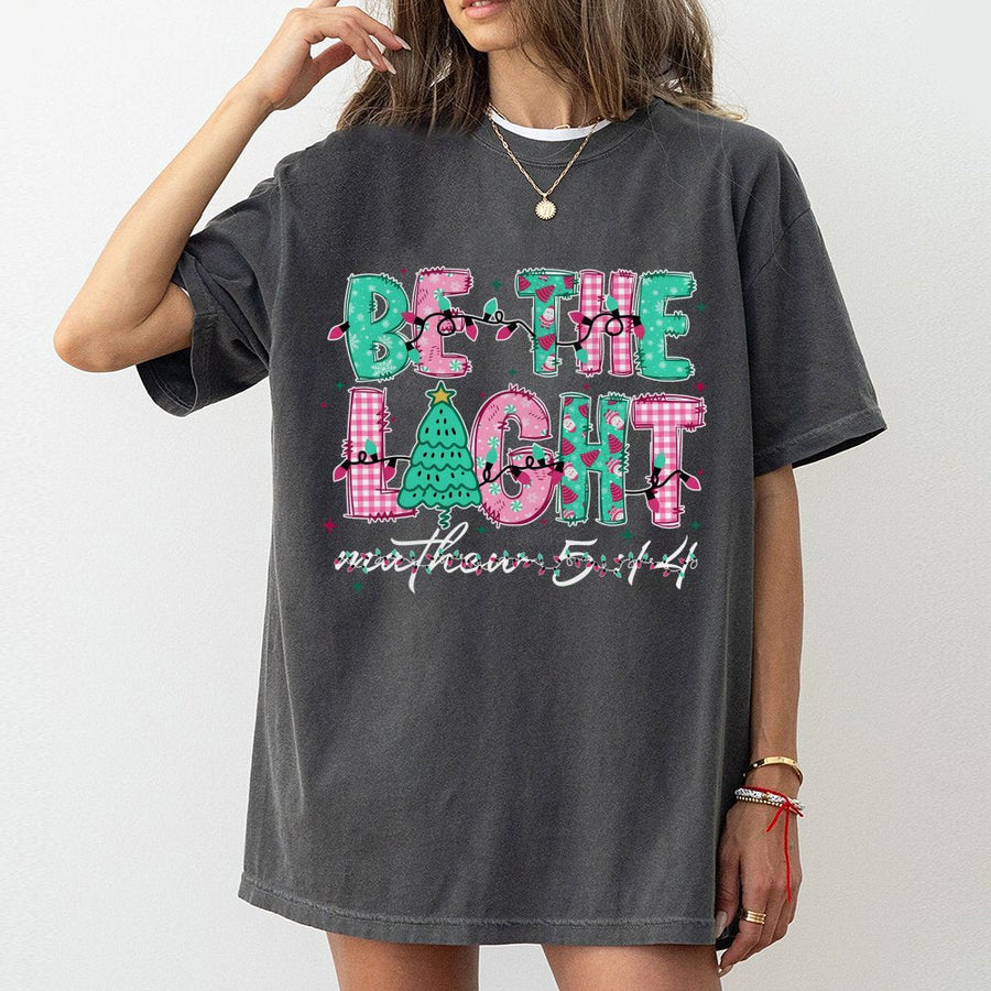 Be The Light Christmas T-Shirt | Bible Verse Matthew 5:14 Graphic | 100% Premium Cotton Tee | Faith-Based Holiday Gift for Women and Men