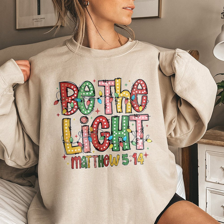 Be The Light Sweatshirt | Matthew 5:14 Christmas Lights Design | Soft Cotton Blend | Religious Christian Gift for Women and Men
