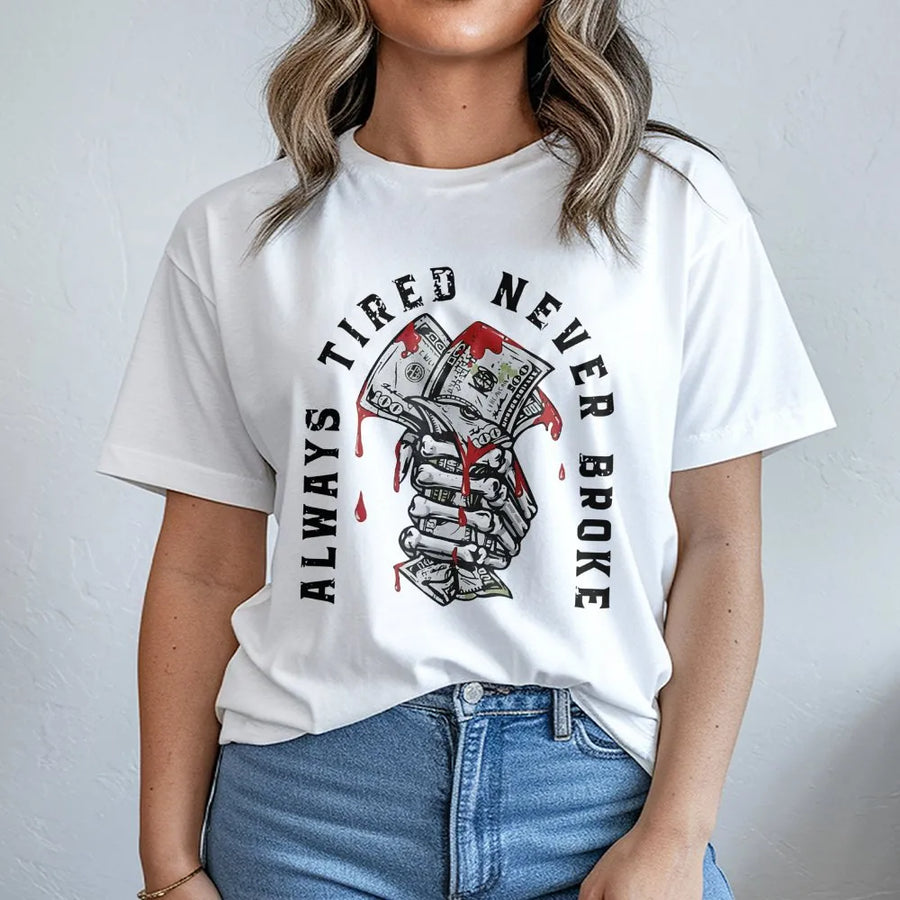 Always Tired Never Broke T-Shirt | Skeleton Hand Holding Money Graphic | Premium Cotton Unisex Tee | Hustle Culture Motivation Gift