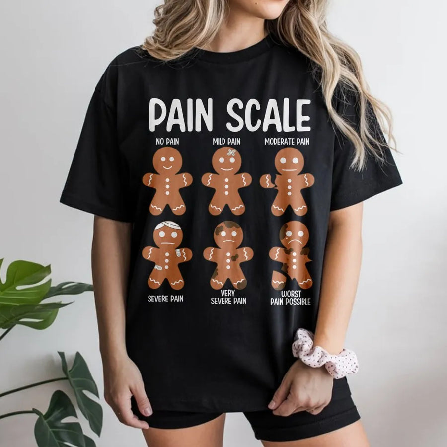 Gingerbread Man Pain Scale T-Shirt | Funny Holiday Cookie Graphic | Premium Soft Cotton Tee | Nurse Christmas Gift Idea for Doctors Medical Staff