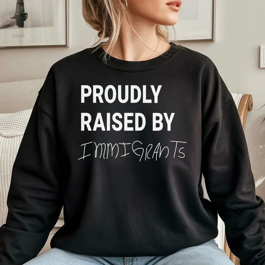 Proudly Raised By Immigrants Sweatshirt | Minimalist Graphic Text Design | Premium Cotton Blend | Empowering First Generation Gift For Him And Her