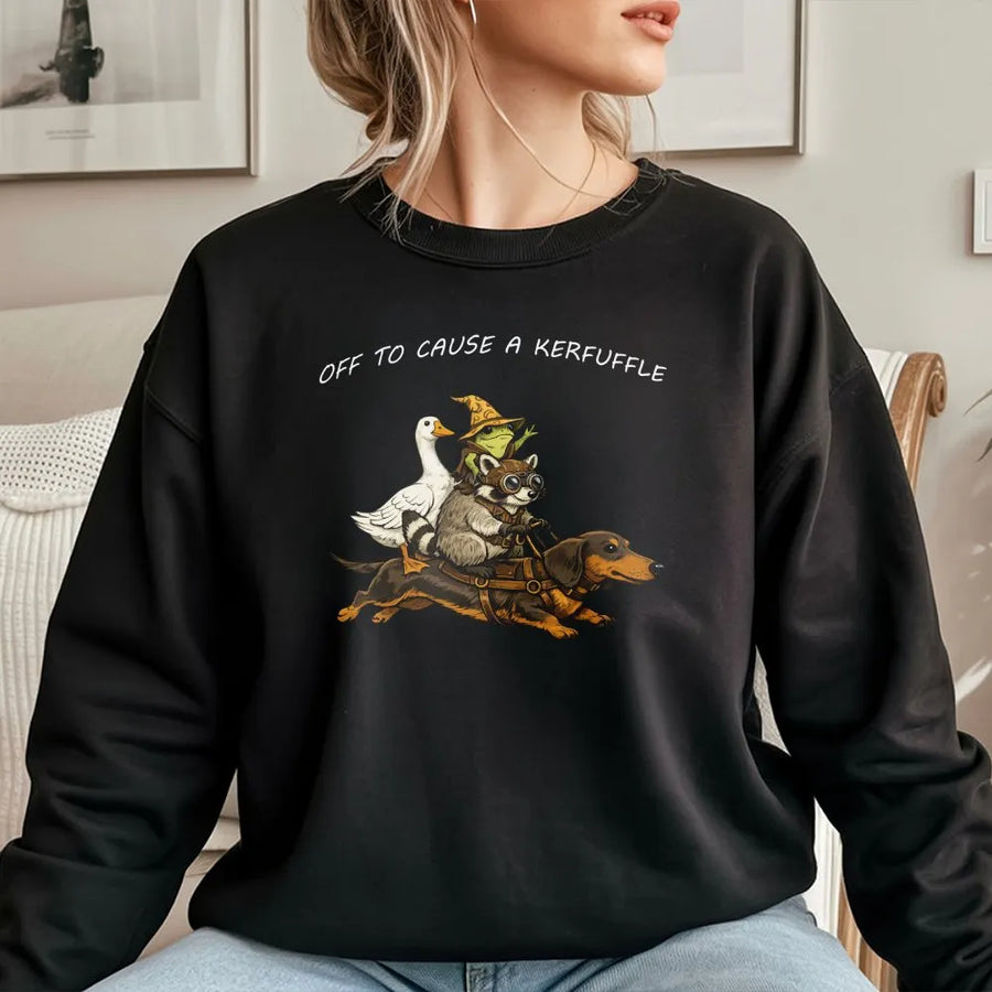 Off To Cause A Kerfuffle Sweatshirt | Funny Raccoon Riding Dachshund Graphic Tee | Premium Soft Cotton | Sarcastic Humor Gift for Animal Lovers