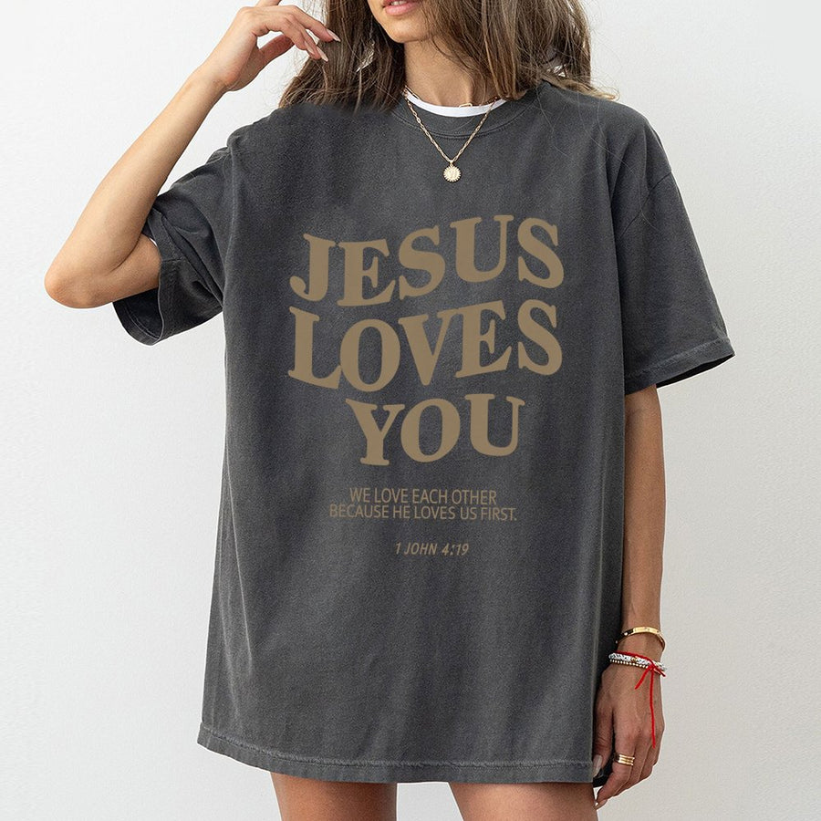 Jesus Loves You T-Shirt | 1 John 4:19 Bible Verse Scripture Design | 100% Cotton Premium Tee | Christian Faith Gift For Men And Women
