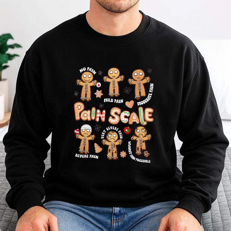Funny Gingerbread Pain Scale Sweatshirt | Cute Christmas Nurse Graphic Tee | Premium Cotton Blend Crewneck | Holiday Gift for Nurses & Medical Staff