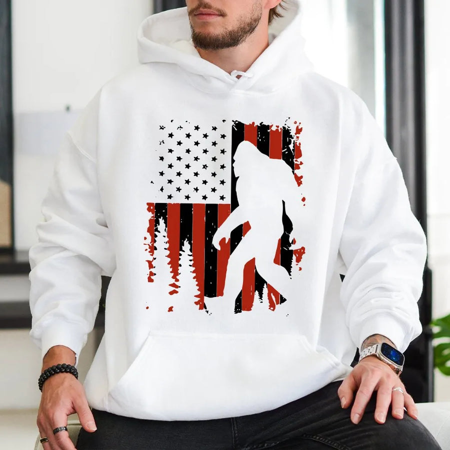 Patriotic Bigfoot Hoodie | Distressed American Flag Sasquatch Graphic | Premium Cotton Blend | Gift for Outdoor Adventure & Cryptid Fans