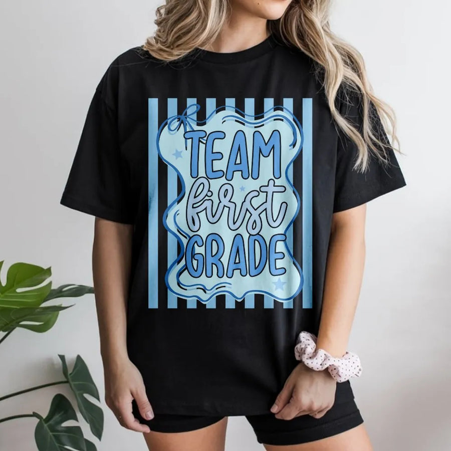 First Grade Teacher Team Shirt | Cute Back to School Striped Design | Premium Soft Cotton Tee | Gift for Elementary Teacher Squad