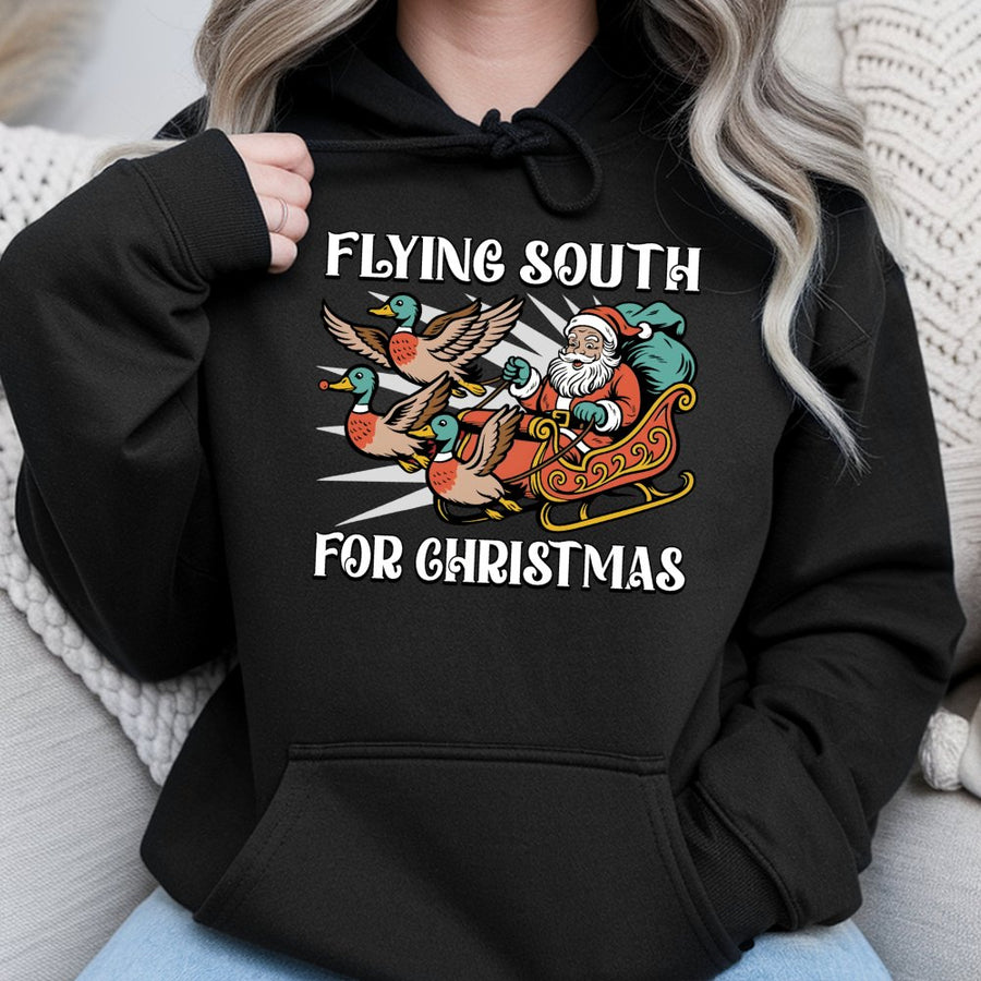 Flying South For Christmas Hoodie | Santa Claus Duck Hunting Graphic | Premium Cotton Blend | Funny Holiday Gift For Hunters And Outdoorsmen