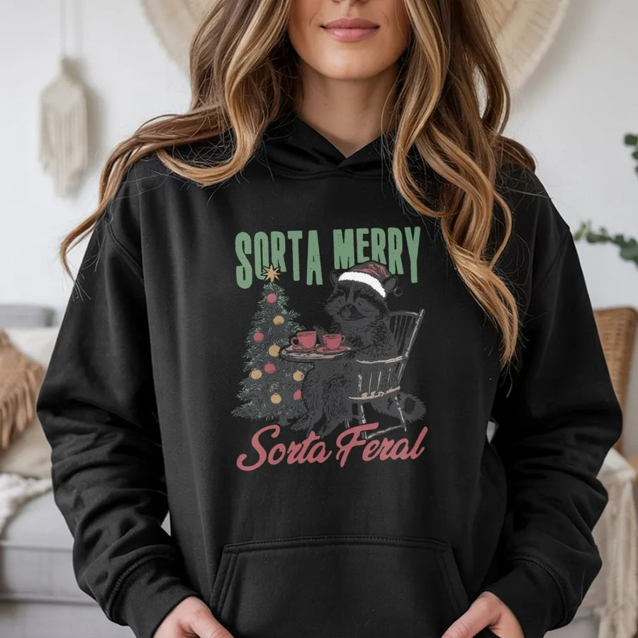 Sorta Merry Sorta Feral Raccoon Hoodie | Funny Christmas Animal Graphic | Premium Cotton Blend | Gift For Wildlife Lovers And Introverts