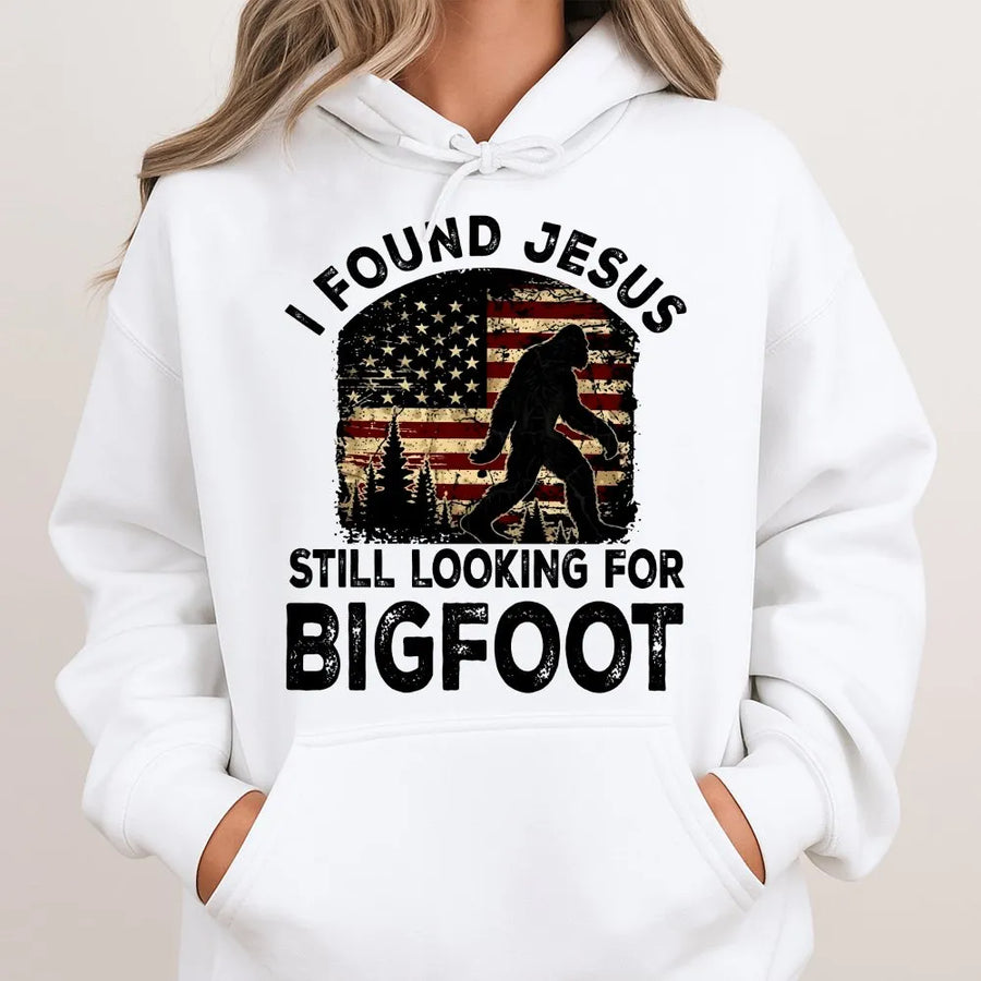 Funny Bigfoot Hoodie | I Found Jesus Sasquatch Graphic with Retro American Flag | Premium Cotton Tee | Gift for Christian Humor & Hunters