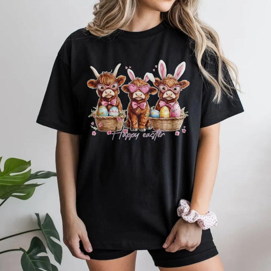 Easter Cow T-Shirt | Cute Highland Calf with Bunny Ears and Eggs | Premium Soft Cotton Graphic Tee | Festive Spring Holiday Gift for Her