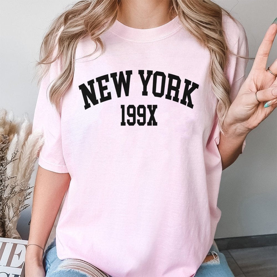 New York 199X Graphic T-Shirt | Retro Varsity Lettering | 100% Cotton Premium Tee | Vintage Aesthetic Gift for Men and Women