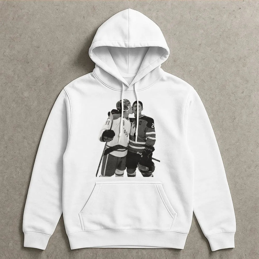 Hockey Player Kissing Hoodie | Graphic Sports Couple Illustration | Premium Cotton-Poly Blend | Fan Gift for Hockey Lovers and Athletes
