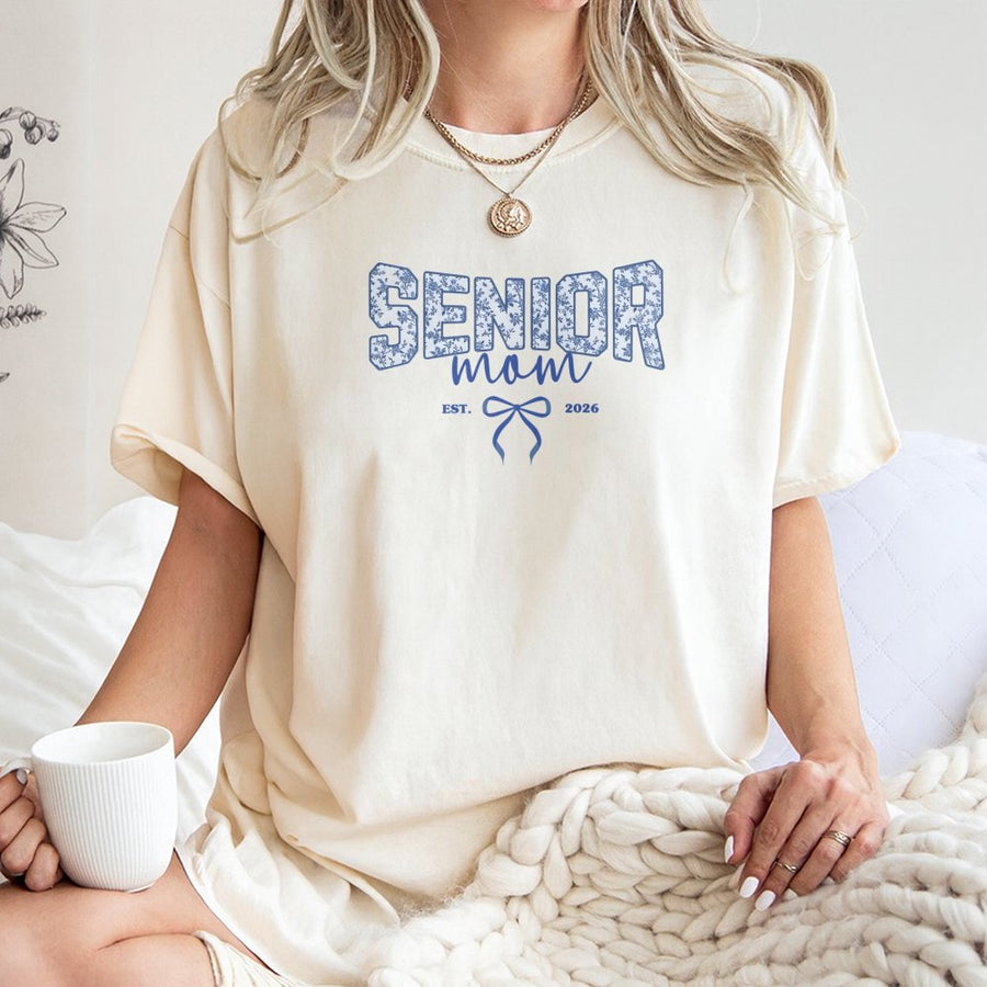 Senior Mom 2026 T-Shirt | Floral Coquette Bow Graphic Tee | Premium 100% Cotton Apparel | Graduation Gift for High School Senior Mom