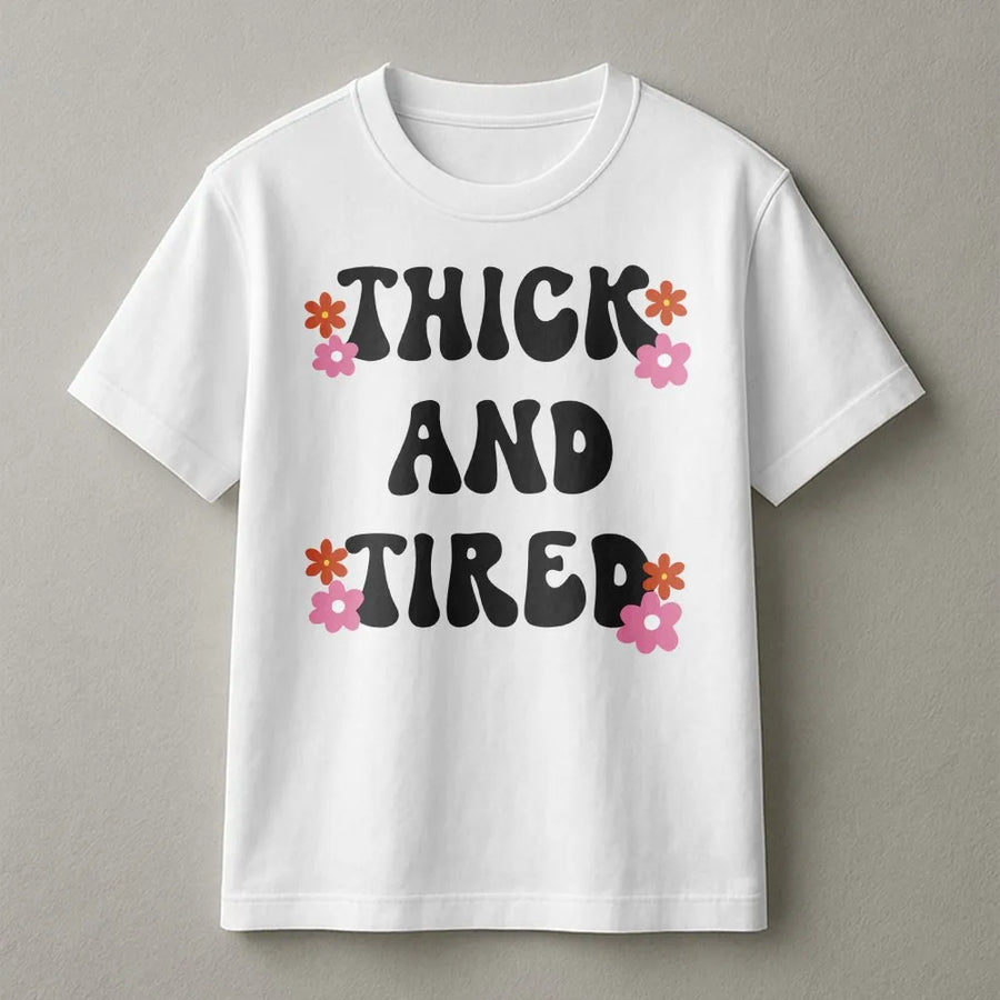 Thick And Tired T-Shirt | Retro 70s Floral Graphic Pullover | Premium Cotton Blend | Funny Relatable Gift for Women