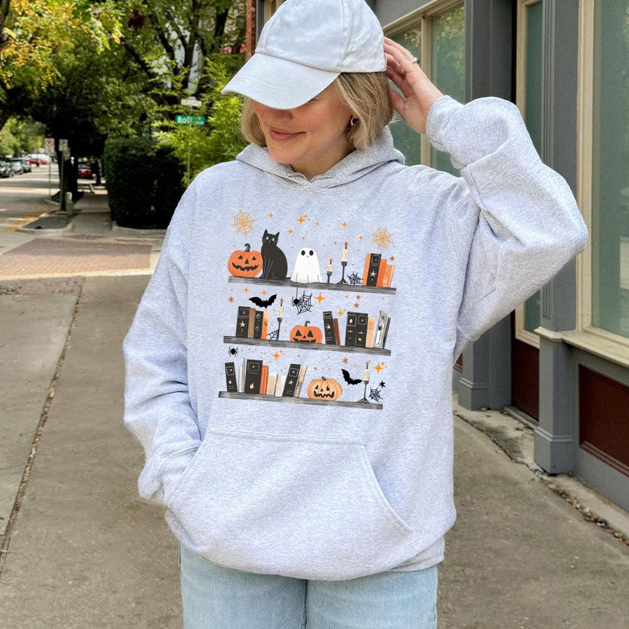 Halloween Bookshelf Hoodie | Spooky Ghost and Cat Library Graphic | Premium Cotton Blend Pullover | Cute Book Lover Gift for Readers