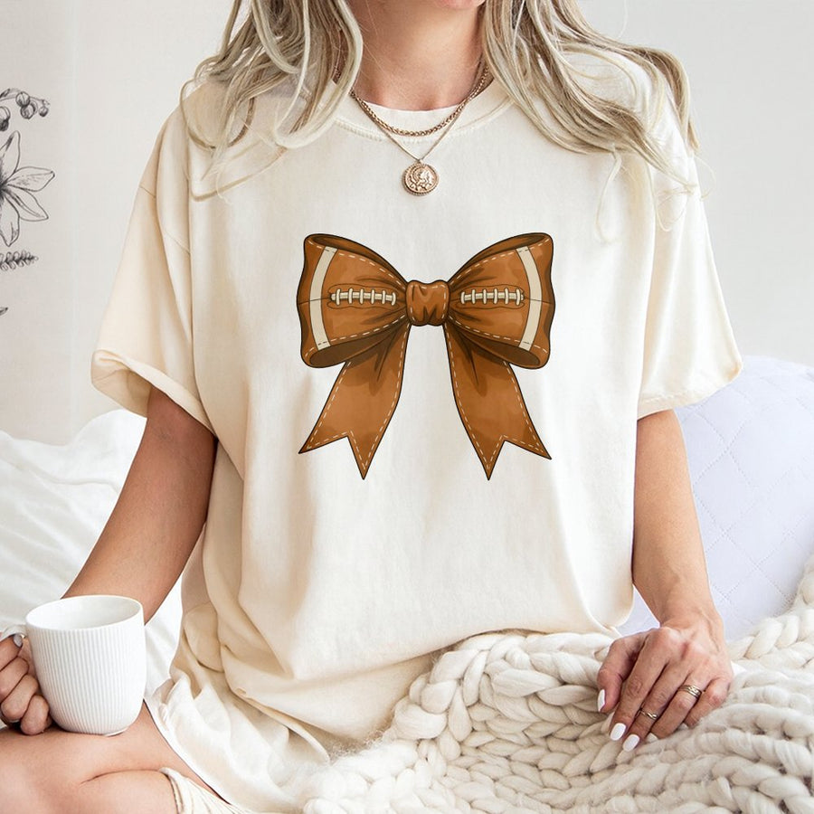 Coquette Football Bow T-Shirt | Aesthetic Sports Graphic Tee | 100% Cotton Premium Quality | Cute Game Day Outfit For Women & Girls