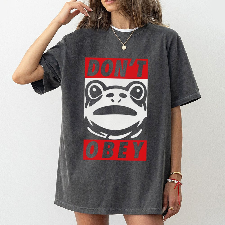 Dont Obey Frog Graphic T-Shirt | Funny Toad Resistance Art | Premium Cotton Unisex Tee | Retro Streetwear Aesthetic Gift for Men and Women