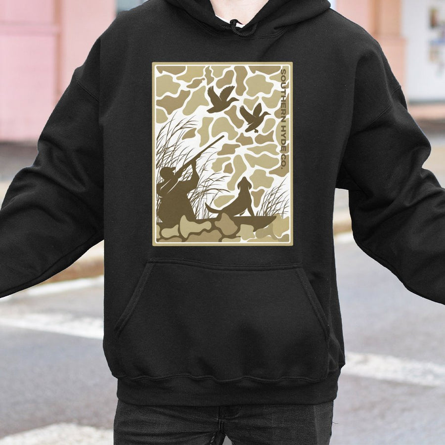 Duck Hunting Hoodie | Retro Camo Hunter Silhouette Graphic | Cotton-Blend Premium Apparel | Gift for Outdoorsmen and Country Life Enthusiasts