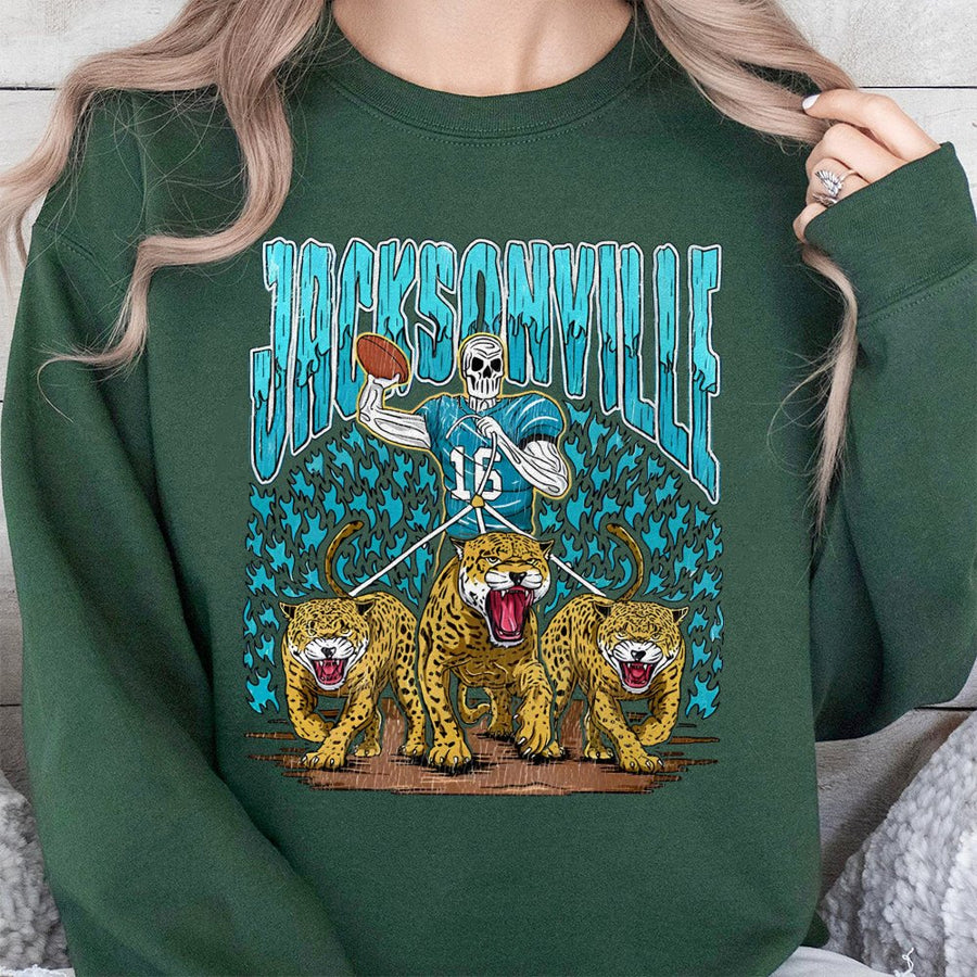 Jacksonville With A Skeleton Football Player Holding A Football And Three Jaguars Sweatshirt