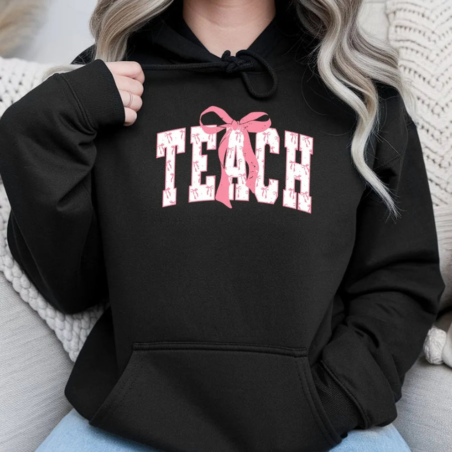Teach Bow Hoodie | Aesthetic Coquette Teacher Apparel | Premium Soft Cotton Blend | Cute Teacher Appreciation Gift for Women and Educators