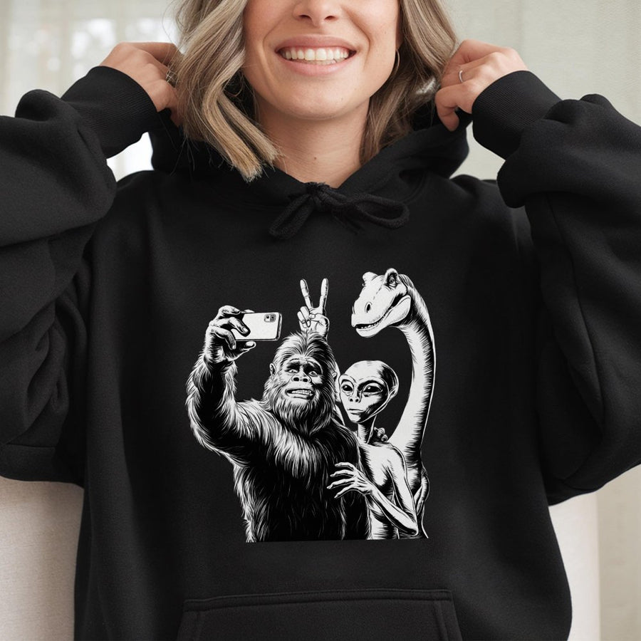 Bigfoot Alien Selfie Hoodie | Funny Cryptid Dinosaur Graphic | Premium Cotton Blend Pullover | Unique Gift For Sci-Fi Lovers