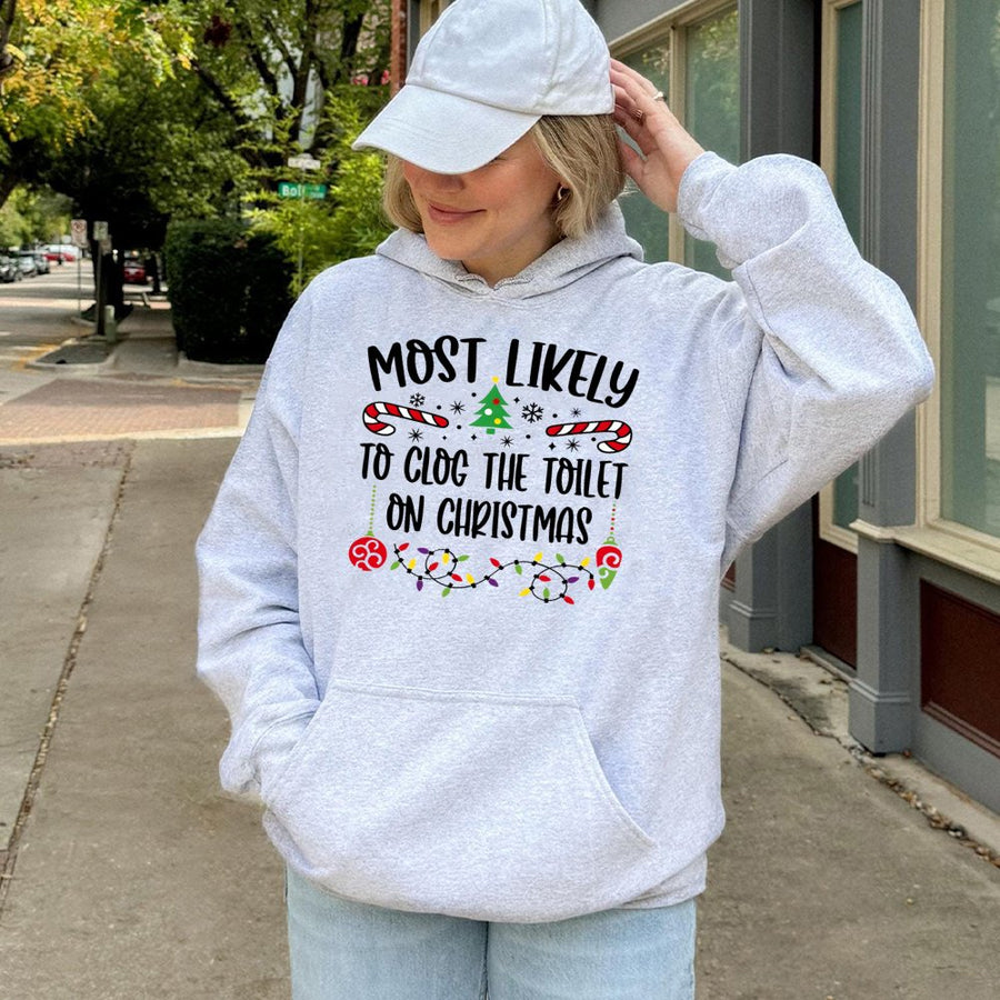 Most Likely To Clog The Toilet Christmas Hoodie | Funny Holiday Humor Pullover | Premium Cotton Blend | Gift For Men And Women