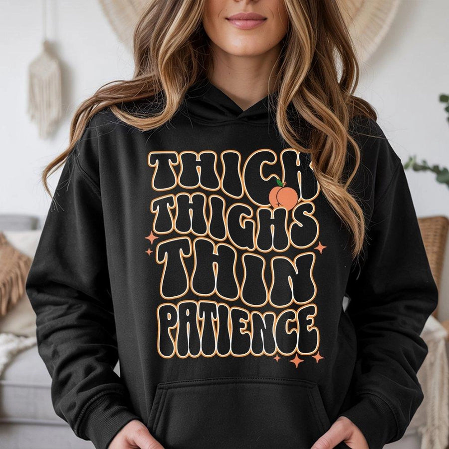 Thick Thighs Thin Patience Hoodie | Retro Groovy Typography Graphic | Premium Cotton Blend | Funny Gym Gift for Women and Fitness Enthusiasts