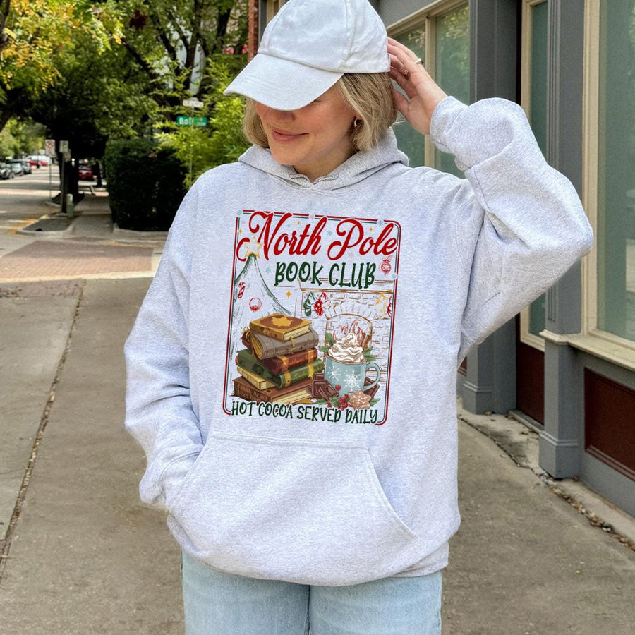 North Pole Book Club Hoodie | Cozy Christmas Reading Graphic | Premium Cotton Blend Sweatshirt | Holiday Gift For Book Lovers Readers