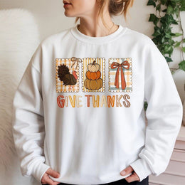 Give Thanks Thanksgiving Sweatshirt | Coquette Fall Pumpkin Turkey Bow Graphic | Premium Soft Blend Crewneck | Cute Holiday Gift for Women