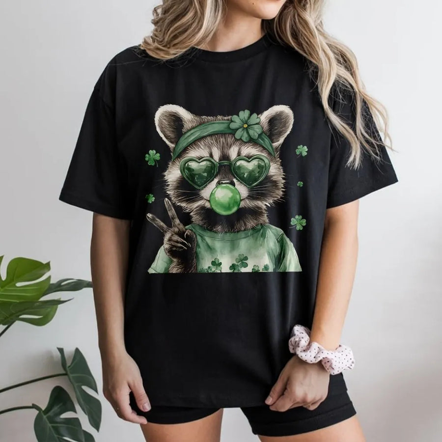 St. Patrick's Day Raccoon T-Shirt | Cute Bubblegum Raccoon with Shamrock Sunglasses | Soft Cotton Premium Graphic Tee | Fun Irish Festival Gift