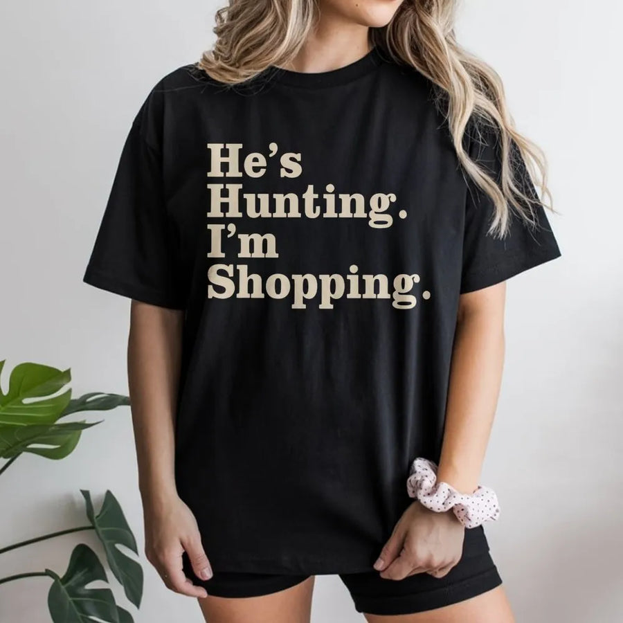 He's Hunting I'm Shopping T-Shirt | Funny Country Wife Graphic Tee | Premium Cotton Soft Crewneck | Perfect Gift for Hunting Season Enthusiasts