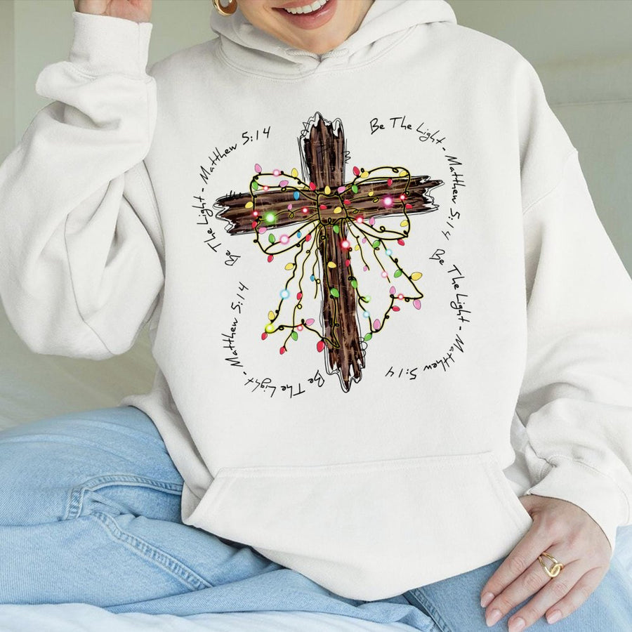Be The Light Hoodie | Matthew 5:14 Cross Christmas Lights Graphic | Premium Cotton Blend | Christian Faith Gift for Him and Her
