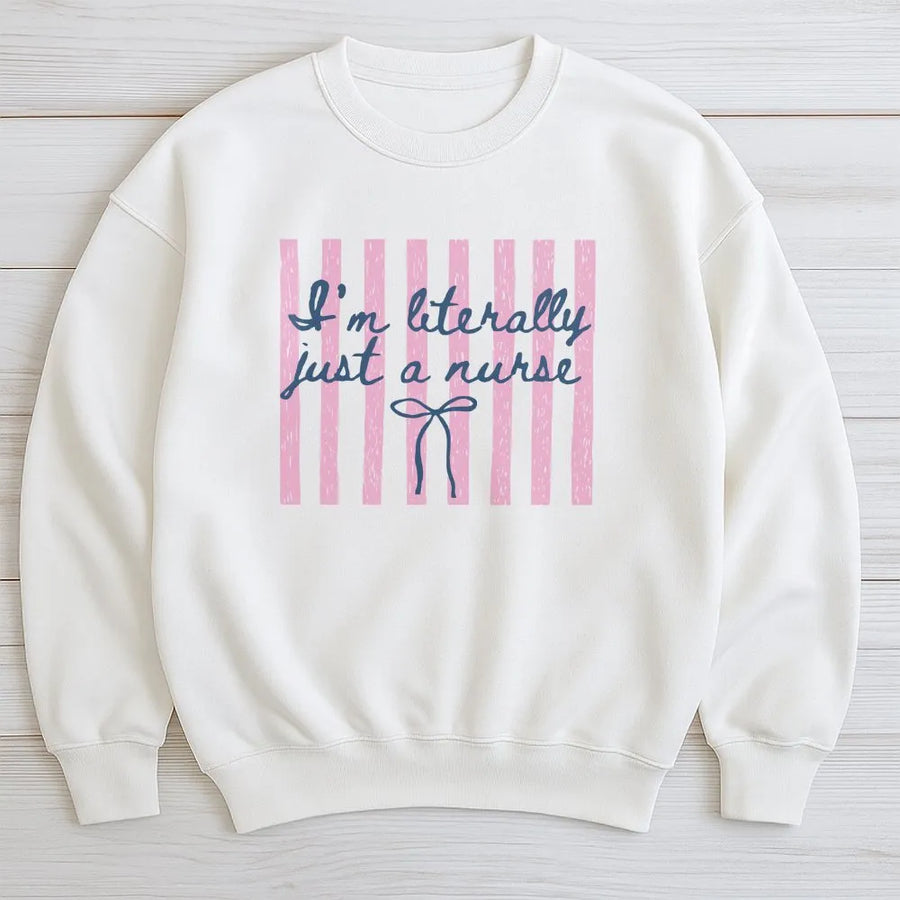 Coquette Nurse Sweatshirt | Preppy Pink Stripe Graphic | Soft Cotton Blend Sweatshirt | Funny Nurse Appreciation Week Gift for ICU, ER, RN
