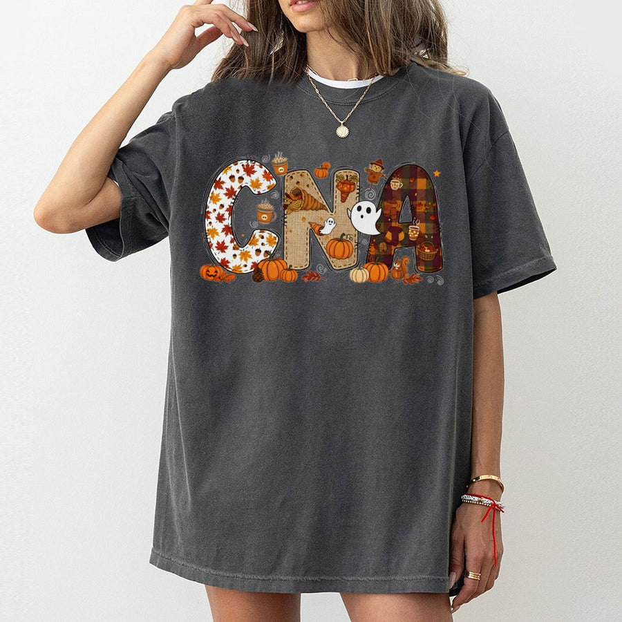 CNA Fall T-Shirt | Pumpkin Halloween Graphic Nursing Assistant Gift | 100% Cotton Premium Tee | Autumn Apparel for Medical Professionals