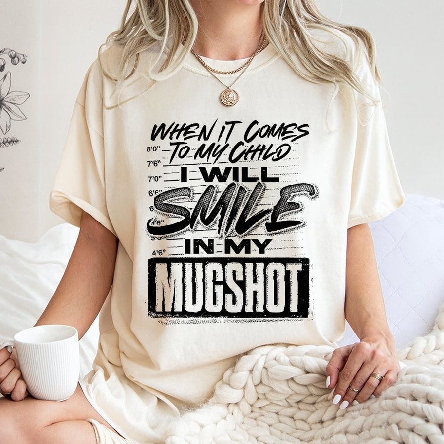 Smile In My Mugshot T-Shirt | Funny Protective Parent Graphic Tee | 100% Premium Cotton Unisex Shirt | Unique Gift For Dad or Mom