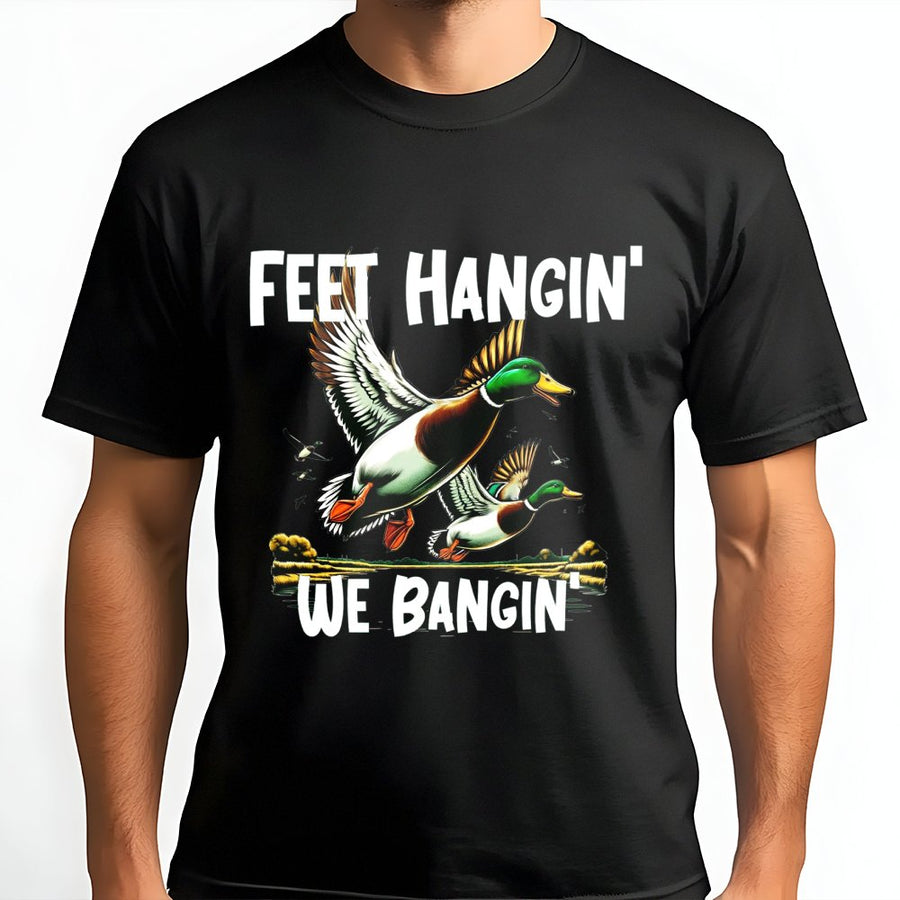 Duck Hunting T-Shirt | Feet Hangin' We Bangin' Mallard Graphic | Premium 100% Cotton Tee | Funny Gift for Hunters & Outdoor Enthusiasts