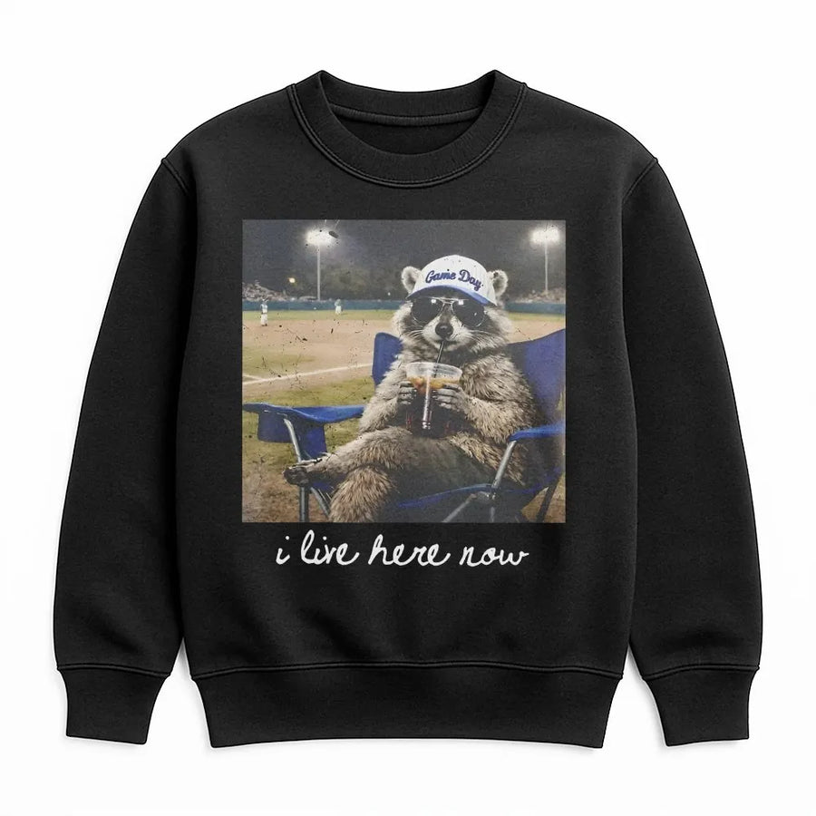 I Live Here Now Raccoon Shirt | Funny Travel Ball Parent Life Meme | Soft 100% Cotton Tee | Gift for Baseball Mom or Softball Dad