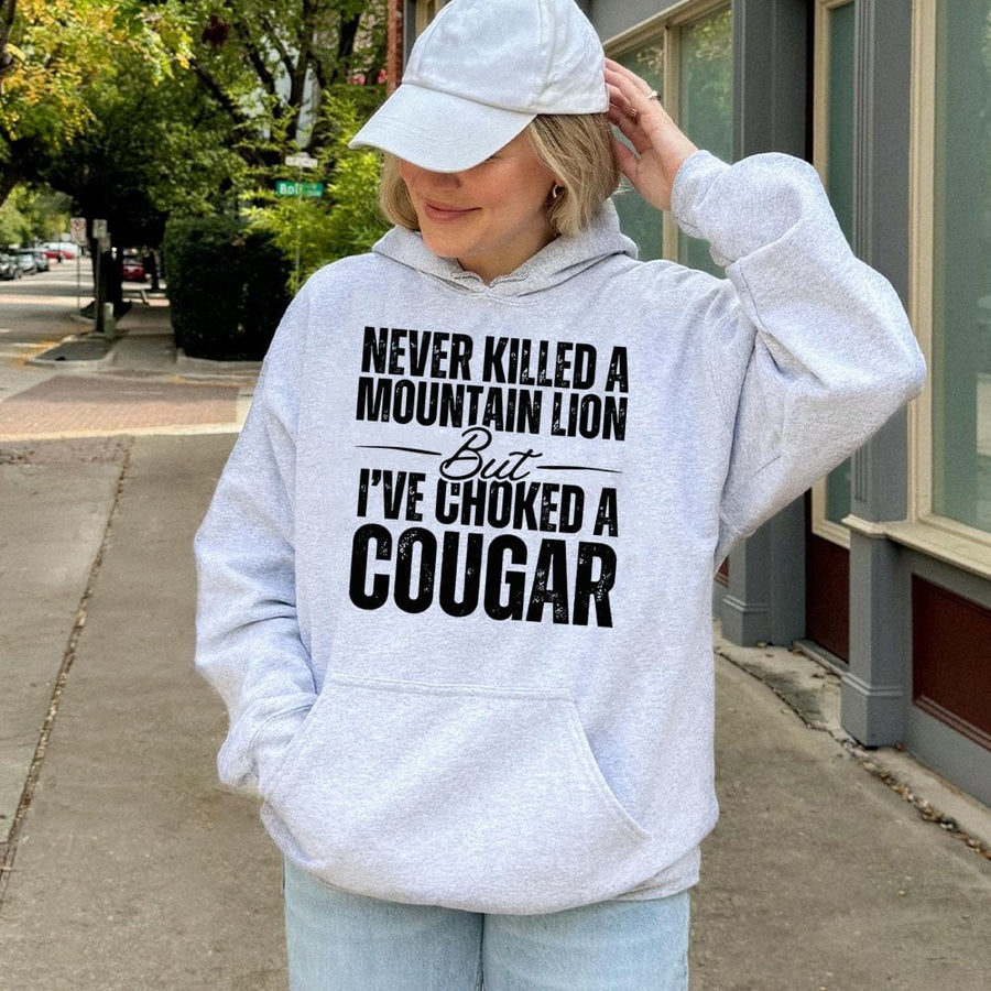 Never Killed A Mountain Lion But I've Choked A Cougar Hoodie | Funny Sarcastic Graphic Pullover | Cotton-Poly Blend | Gift For Men And Women