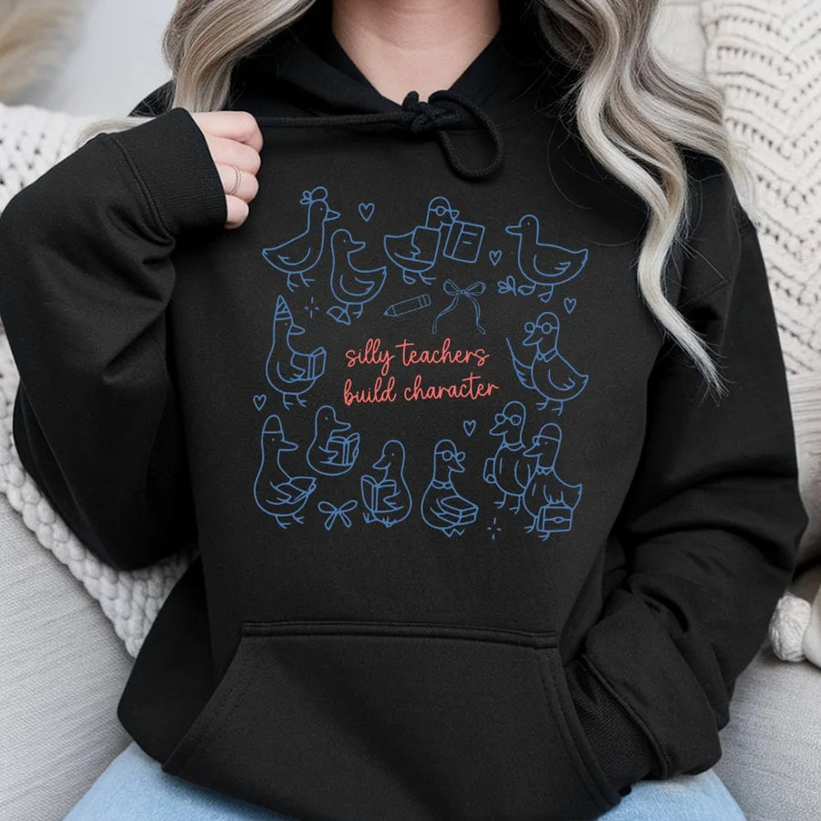 Silly Teachers Build Character Hoodie | Cute Goose Graphic Teacher Gift | Premium Cotton Blend | Funny Back To School Teacher Apparel