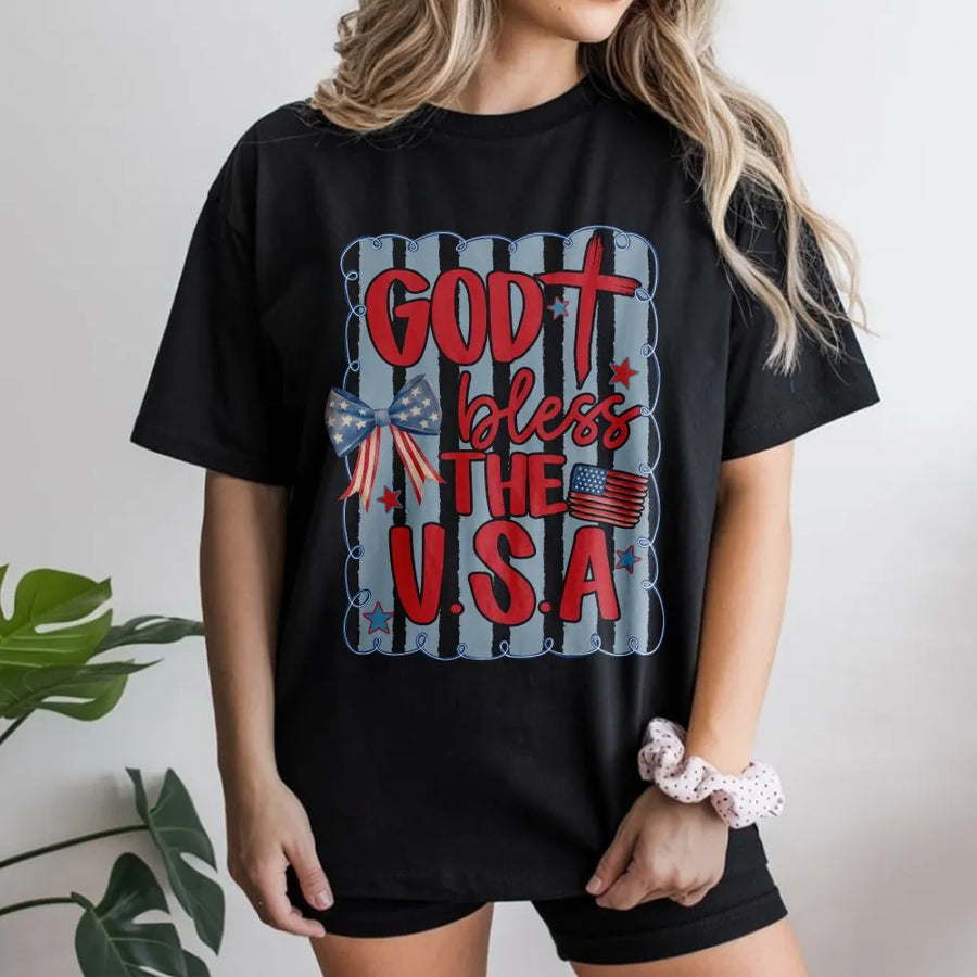 God Bless The USA T-Shirt | Patriotic Coquette Bow Graphic | Soft Cotton Blend | Christian 4th of July Gift For Women