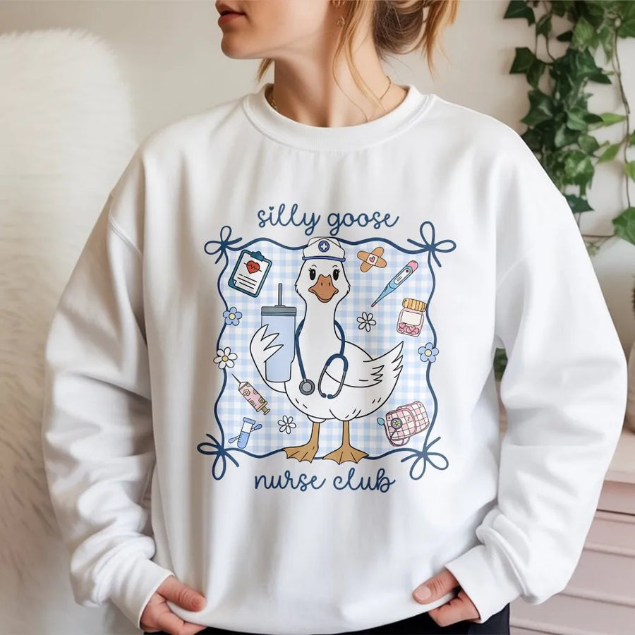 Silly Goose Nurse Club Sweatshirt | Cute Medical Duck Graphic | Cotton-Blend Comfort | Gift for Nursing Student, RN, LPN, or Nurse Practitioner